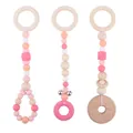 Pink silicone and beech wood baby teether rings set with lemon carving and bells - Pink