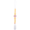 Silicone pacifier clip with pale yellow beads and a pink donut charm for babies - Donut
