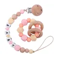 Pink and orange silicone baby pacifier clip and beech wood teething ring rattle set - Pink Jewelry Set