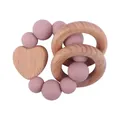 Pink silicone beads and heart-shaped beech wood ring teether for baby soothing - Dusty Rose