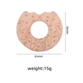 Donut-förmiger Beißring aus Buchenholz mit Gravur und Produktabmessungen für Babys - Donut