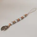 Detail of baby pacifier clip with gray silicone beads and natural wooden accents - Light Gray