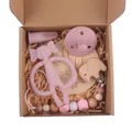 Macro shot of dusty rose silicone baby teether gift set with wooden elephant clips - Dusty Rose Elephant