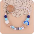 Chupetero de silicona arcoíris con cuentas de letras BABY y clip de madera bebé - Azul