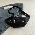 Black canvas sports fanny pack with multi-layer zipper pockets and adjustable strap - Black