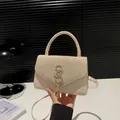 Mini sac à main champagne avec strass brillants et décoration de glands en métal - Or