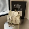 Zaino retrò in tela crema con doppie tasche frontali e dettagli con bordi neri - Bianco Sporco