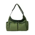 Army green canvas crossbody bag featuring dual front flap pockets and adjustable strap - Green