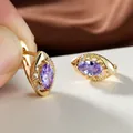 Boucles d'oreilles créoles dorées avec améthyste marquise et détails filigranes - Violet