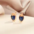 Élégantes boucles d'oreilles dorées avec zircon bleu roi en forme de poire et finition or - Bleu