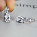Eleganti orecchini ovali in zirconia blu con finitura in oro champagne per sposa - Argento Bianco