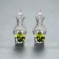 Elegante silberne Brisur-Ohrringe mit ovalen olivgrünen Kristallen und Zirkonia-Akzenten - Platin Olivgrün