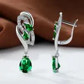 Elegant silver leverback earrings with emerald green teardrop stones and zircon accents - Silver Emerald Zirconia