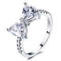 Silver bow ring with triangle-cut zircons and pavé-set diamonds on a polished band - US 7 / Platinum White Diamond