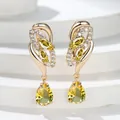 Elegant champagne gold hoop earrings with yellow teardrop stones and tiny white diamonds - Champagne Gold Yellow Stone