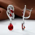 Silver leverback earrings featuring red marquise cut stones and white zircon accents - Platinum Plated Red Zirconia