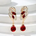 Champagne gold hoop earrings featuring marquise and pear cut red gemstones and zircon - Champagne Gold Red Stone