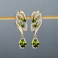 Golden drop earrings with olive green marquise and pear cut stones in a luxury finish - Champagne Gold Olive Green