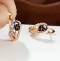Roségouden creolen met meerkleurige mystieke stenen en zirkonia bladvormige accenten - Goud Kleur Multicolor Zirkonia