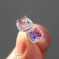 Macro detail of square gradient tourmaline studs with cubic zirconia halo setting - Silver-Tone Pink Blue