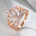 Elegante roségouden kroonring met hartdetails en fonkelende zirkonia steentjes - US 5 / Roségoud