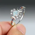 Zilveren ring met halve maan, een ronde opaal en een kleurrijke edelsteenband - US 6 / Witgoud Opaal Meerkleurige Zirkonia