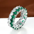 Eternity ring featuring emerald green and clear zircon stones in a silver-toned band - US 6 / Emerald Green