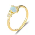 Elegante 18K gouden ring in takstijl met ovale blauwe opaal en kleine bloemaccenten - US 6 / Goud Witte Opaal