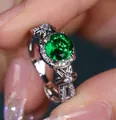 Anillo de plata con gema redonda verde y detalles florales con diamantes blancos - Talla 5 / Blanco Oro Esmeralda