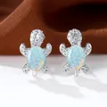 Orecchini a tartaruga in argento con opale blu e dettagli in micro-pave di zirconi - Opale Bianco Platino