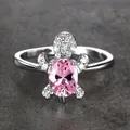 Silver turtle ring featuring a large oval pink gemstone shell and pave-set white zircons - Size 6 / Pink Zirconia