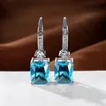 Silver drop earrings with rectangle blue stones and micro-paved sparkling zircons - White Gold Plated Aqua Blue