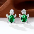 Orecchini a perno a tartaruga in argento con pietre verdi e micro zirconi incastonati - Zirconia Verde Platino