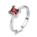 Silver square ring featuring a red ruby stone in a classic four-prong setting - Size 6 / Red Zirconia