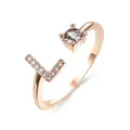 Rose gold adjustable ring featuring a pavé-set letter L and a sparkling round main stone - Letter L / Rose Gold