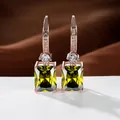 Pendientes largos en oro rosa con piedra verde esmeralda y detalles de circonita - Oro Rosa Plateado Zirconia Verde Oliva