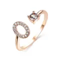 Rose gold adjustable ring featuring a round main stone and pavé oval accent - Letter O / Rose Gold