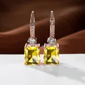 Pendientes largos de oro rosa con circonitas amarillas rectangulares y detalles finos - Chapado en Oro Rosa Circón Amarillo