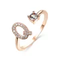 Rose gold adjustable ring featuring a pavé-set letter Q and a round brilliant cut stone - Letter Q / Rose Gold
