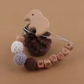 Detail of baby pacifier clip with wooden elephant, crochet beads and BABY engraving - Elephant