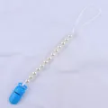 Detail of blue plastic clip and cream pearls on baby pacifier chain with secure cord - Dark Blue