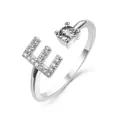 Adjustable silver ring featuring a sparkling letter E and round cubic zirconia stone - Letter E / Platinum