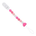 Baby Schnullerkette mit rosa Silikonperlen und Herzanhänger auf weißem Hintergrund - Rosenrot