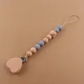 Detailed view of heart beech wood clip and silicone beads for baby pacifier chain - Gray