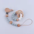 Detail of whale-shaped beech wood clip and silicone teething beads set for baby - Grey Blue (Pacifier Clip And Teether Ring)