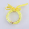 Set di bracciali in silicone giallo glitterato con nastro decorativo e chiusura - Giallo