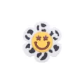 DIY baby teether accessory featuring a cartoon flower with cow pattern and yellow smiley face - Black