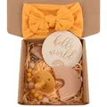 Infant gift set with yellow bow headband, wood rainbow toy, and pacifier clip kit - Turmeric