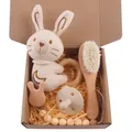 Baby gift set with beige rabbit plush toy, soft hairbrush, and wooden teething ring - Rabbit