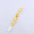Detail von Baby Schnullerkette mit gelben Silikonperlen und Giraffen Anhänger Dekor - Giraffe
